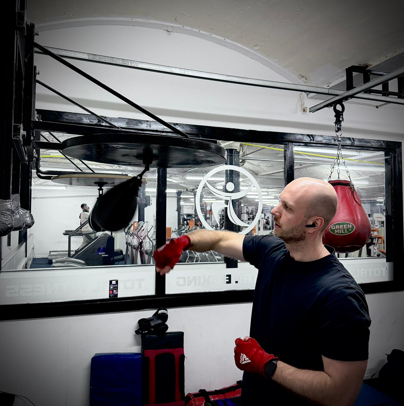 Member boxing training with speed ball