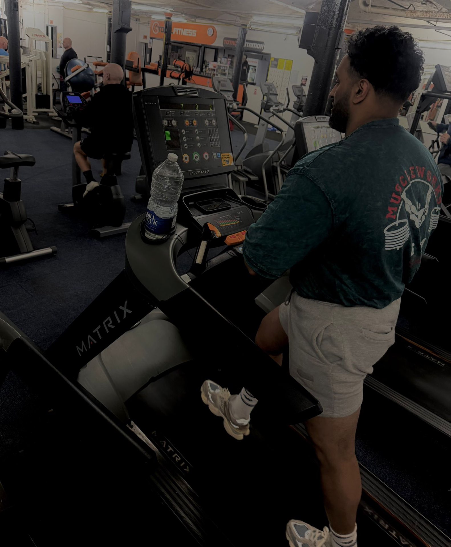 Member training on the Matrix treadmill
